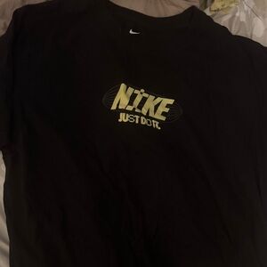 Nike Black Tee with Vibrant Yellow Graphic